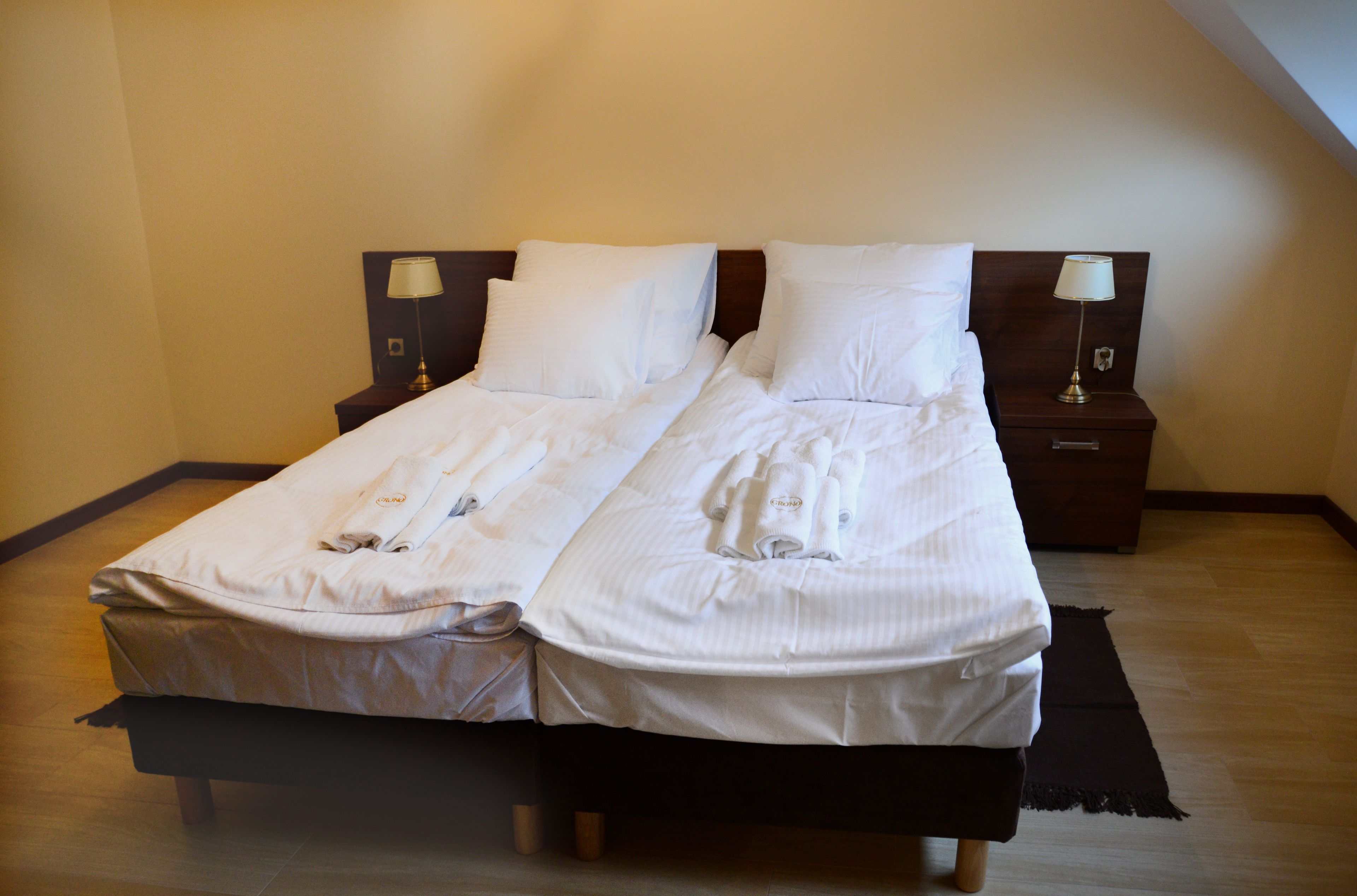 premium bedding, memory-foam beds, desk, blackout curtains