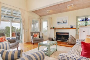 Deluxe Villa, 4 Bedrooms | Living room | Flat-screen TV, fireplace - Baleen Beach House (Cape Town)