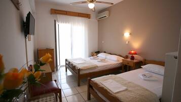 Quarto triplo, vista para a cidade | Roupas de cama de algodão egípcio, roupas de cama premium