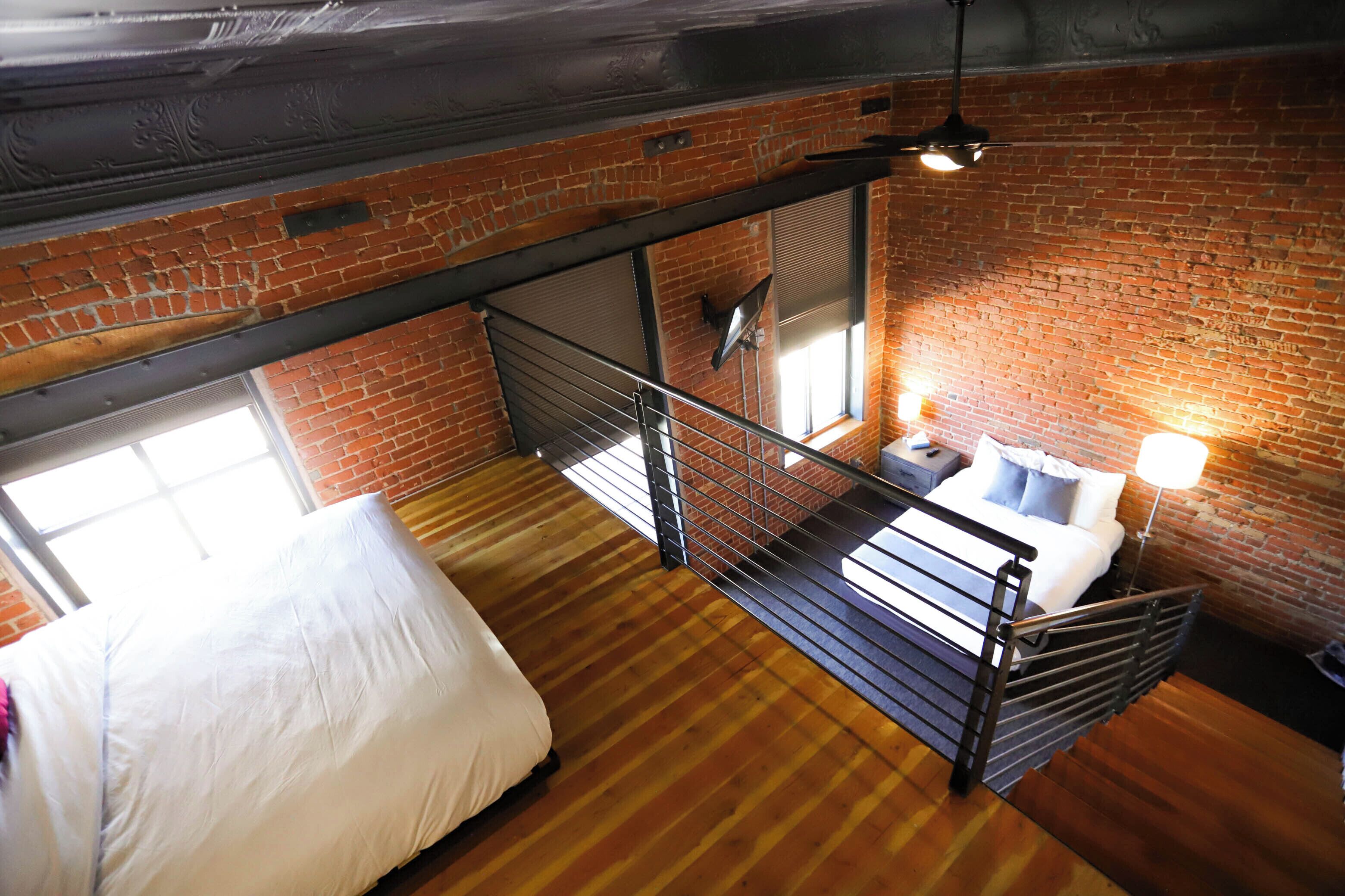 premium bedding, desk, laptop workspace, blackout curtains