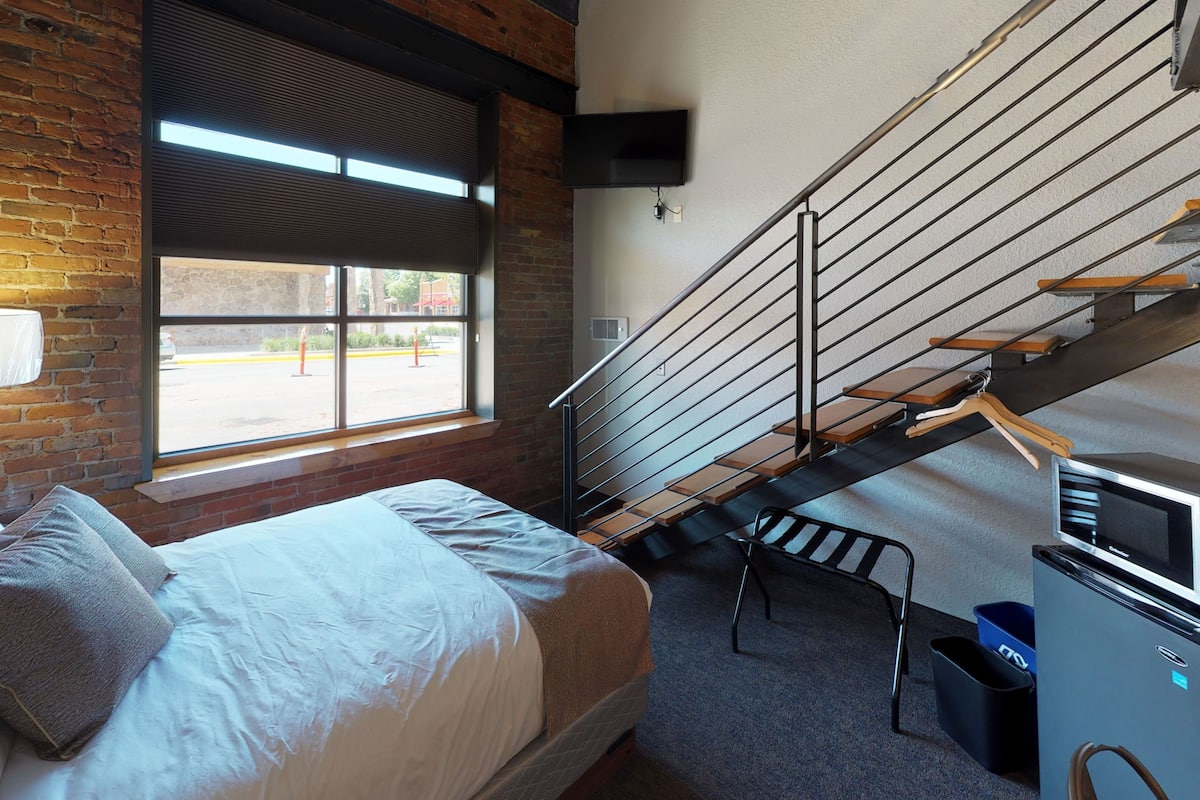 premium bedding, desk, laptop workspace, blackout curtains