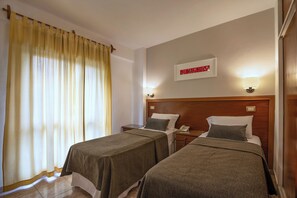 Standard Apartment, Multiple Beds | Premium bedding, down comforters, in-room safe, individually furnished