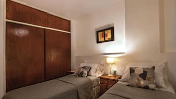 Standard Apartment, Multiple Beds | Premium bedding, down comforters, in-room safe, individually furnished