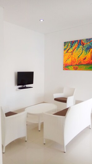 Televisión de pantalla plana, reproductor de DVD