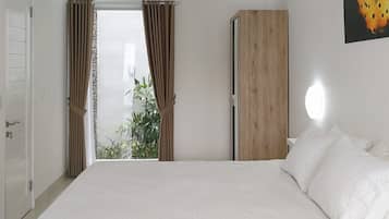 Departamento familiar, 2 habitaciones, para no fumadores | Ropa de cama de alta calidad y minibar