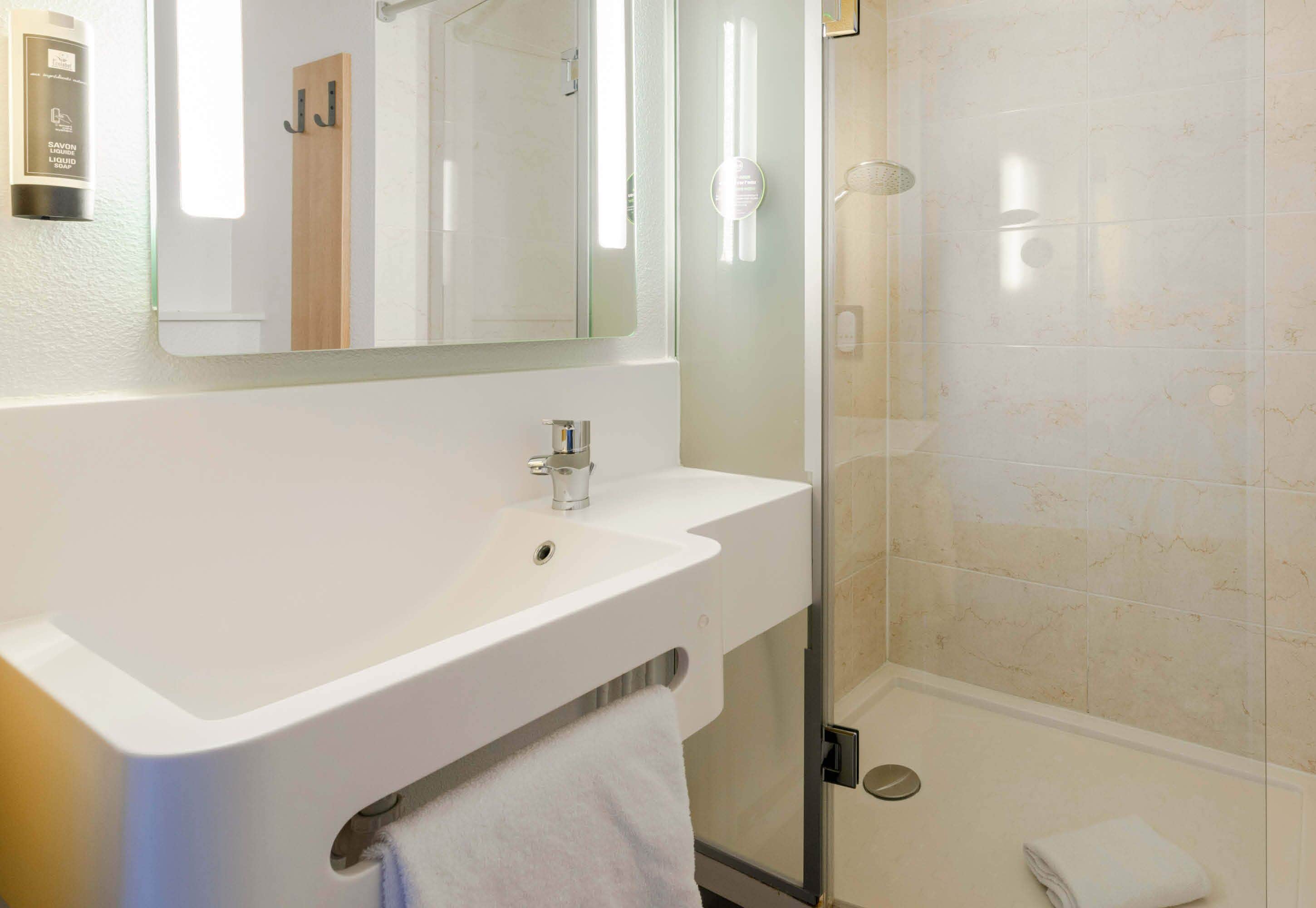 Shower, towels, soap, shampoo