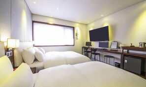 Habitación Deluxe con 2 camas individuales | Ropa de cama de alta calidad, edredones de plumas, decoración individual