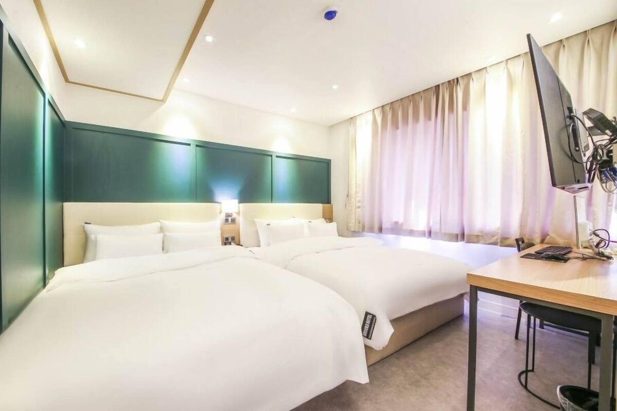 家庭套房 | 高級寢具、羽絨被、書桌、手提電腦工作空間