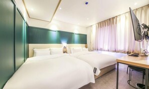 Suite familiar | Ropa de cama de alta calidad, edredones de plumas, decoración individual