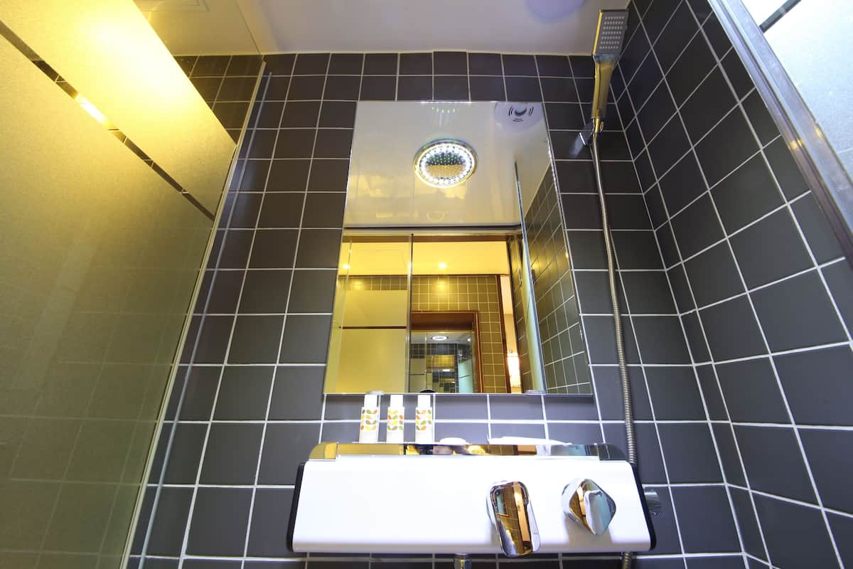 premium bedding, down duvets, desk, laptop workspace