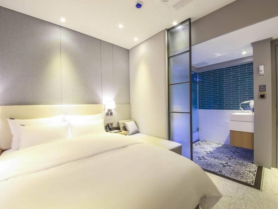 Premium bedding, down duvets, desk, laptop workspace