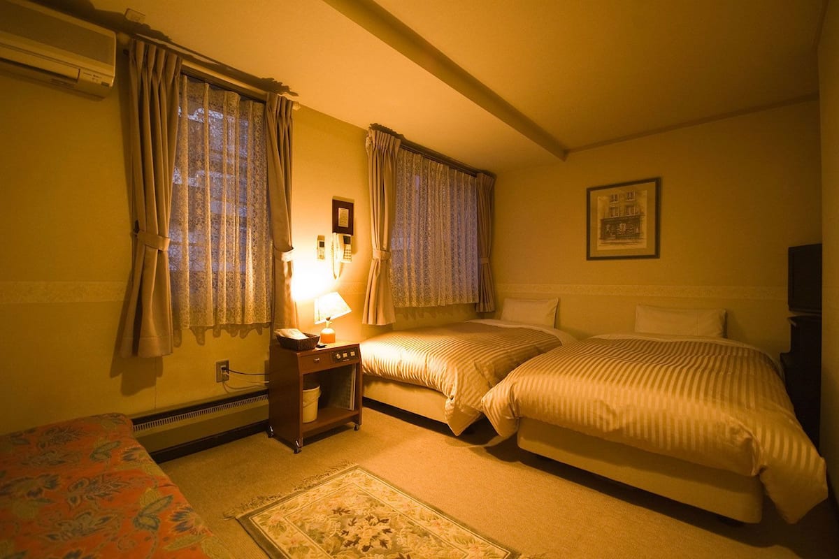 Down comforters, desk, blackout drapes, soundproofing