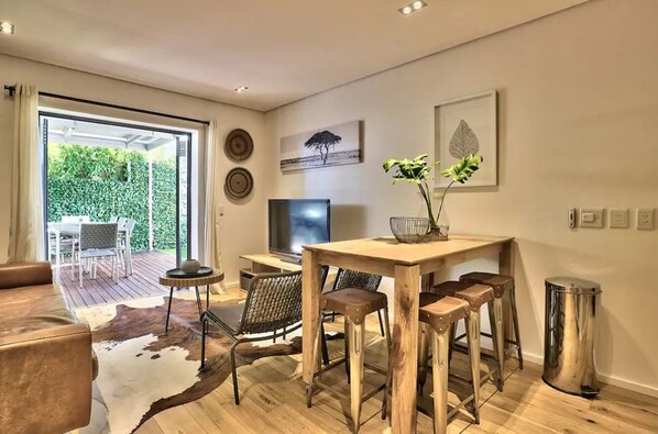 Premier Apartment, Multiple Beds, Non Smoking | Living room | Flat-screen TV - Queensbury 4 (Cape Town)