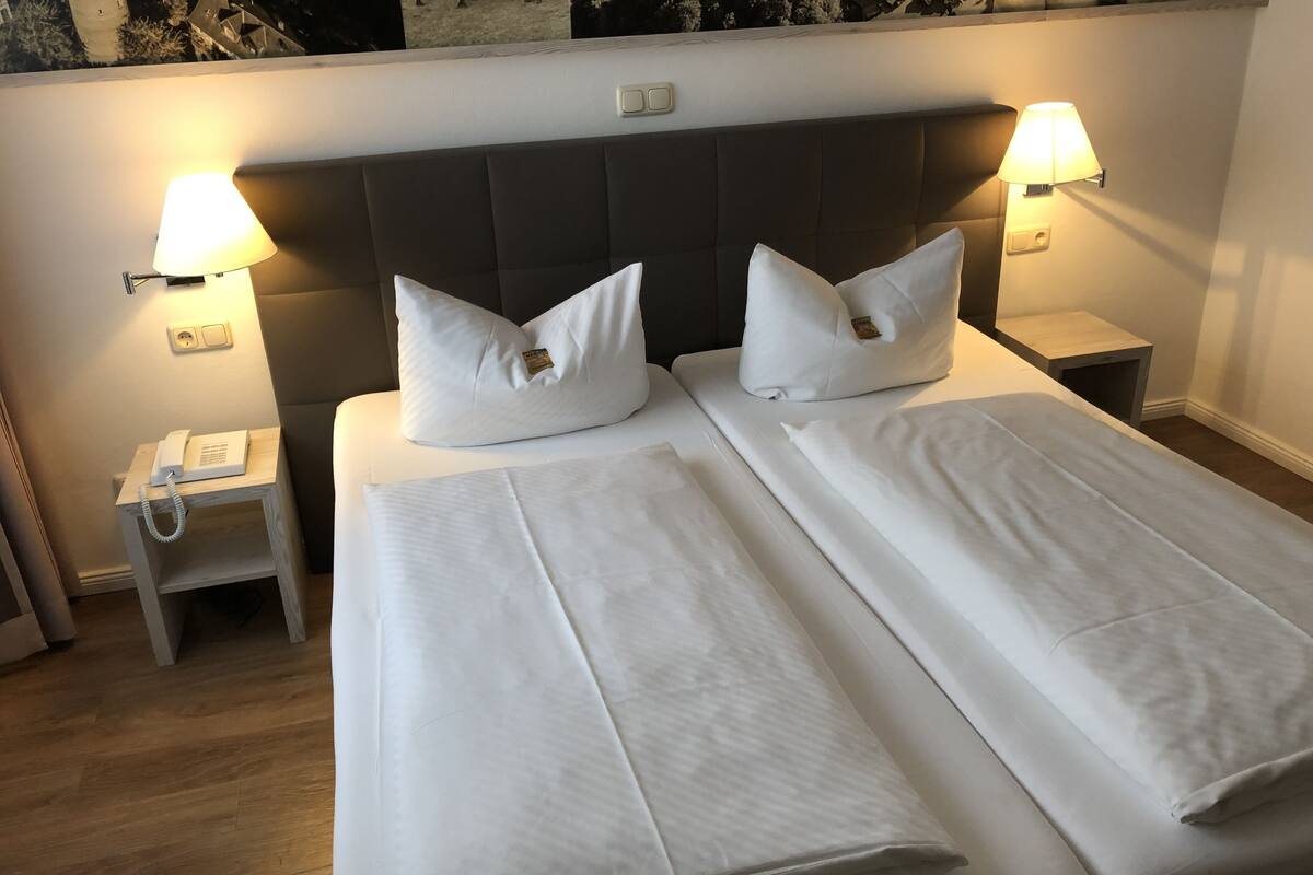 desk, blackout curtains, bed sheets