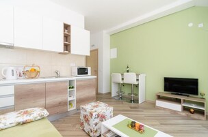 Apartamento (Apartments Marmo - Deluxe One Bedroom) | Sala de estar | TV de tela plana