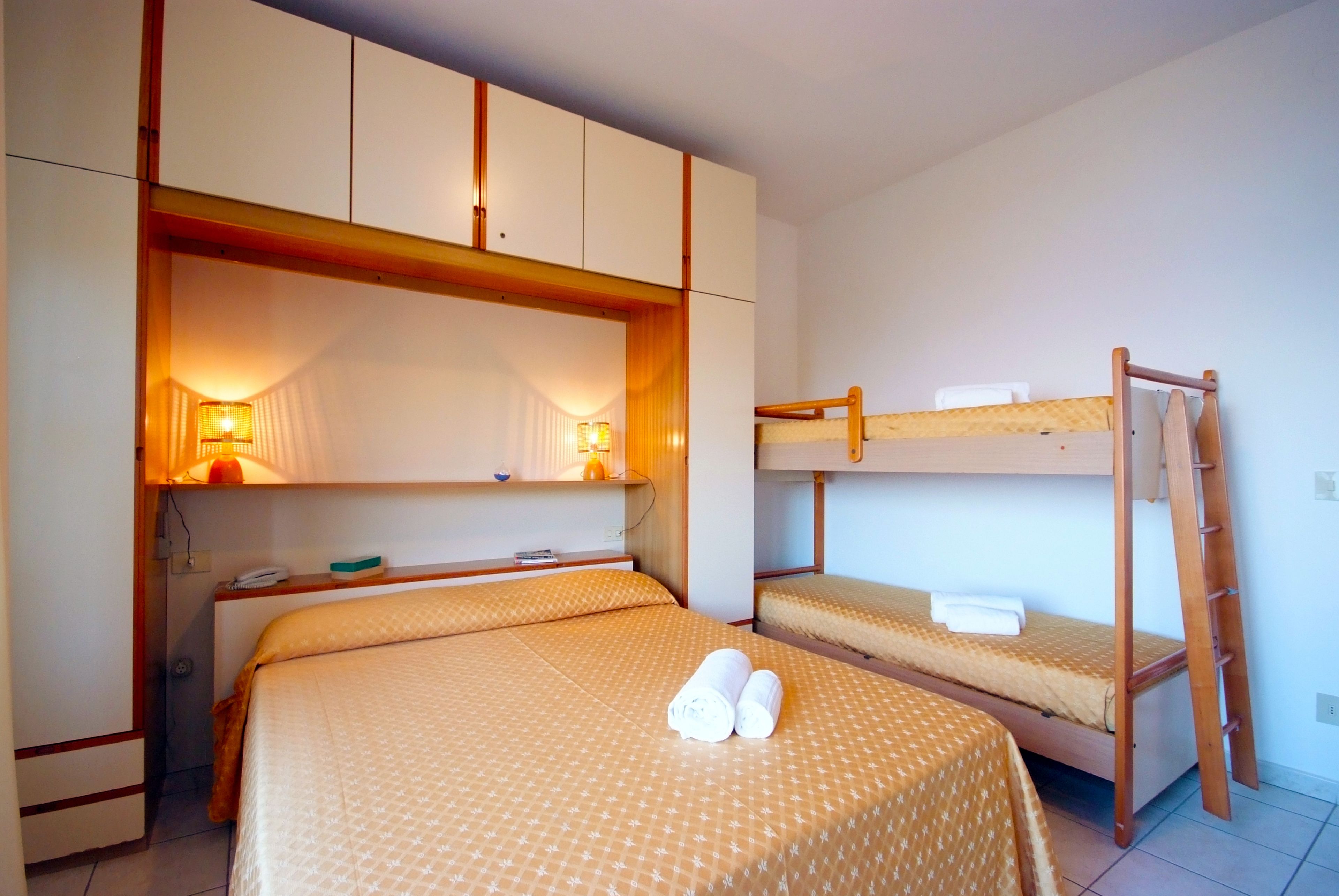 family quadruple room, sea view | in-room safe, desk, free wifi, bed sheets