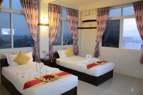 Standard Room, Multiple Beds, Non Smoking, River View | Premium bedding, blackout drapes, rollaway beds, free WiFi