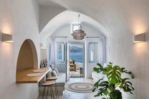 Deluxe Suite, 1 Bedroom, Hot Tub, Sea View | Living area | 32-inch flat-screen TV with cable channels, TV, Netflix
