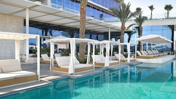Outdoor pool, open 8:00 AM to 9:00 PM, free pool cabanas, pool umbrellas