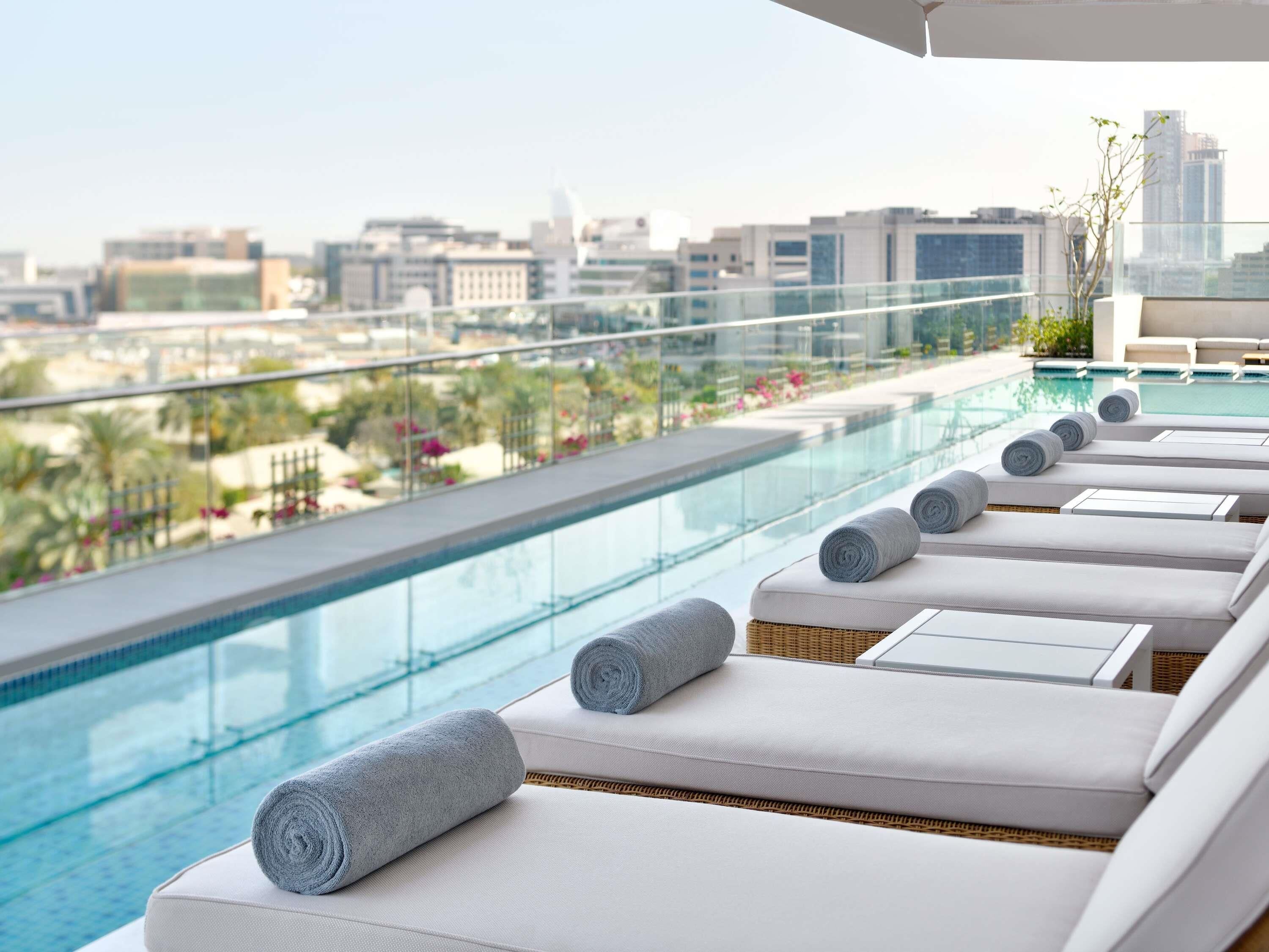 Outdoor pool, open 8:00 AM to 9:00 PM, free cabanas, pool umbrellas