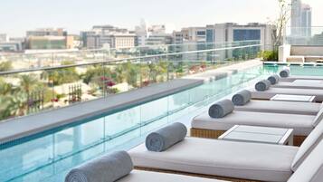 Outdoor pool, open 8:00 AM to 9:00 PM, free cabanas, pool umbrellas