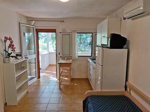 Bungalow, 2 Bedrooms, Poolside (4 pax) | Living area | Flat-screen TV - Villaggio Gabbiano Beach (Vieste)