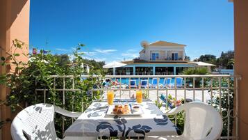 Triple Room, Pool View | Balcony