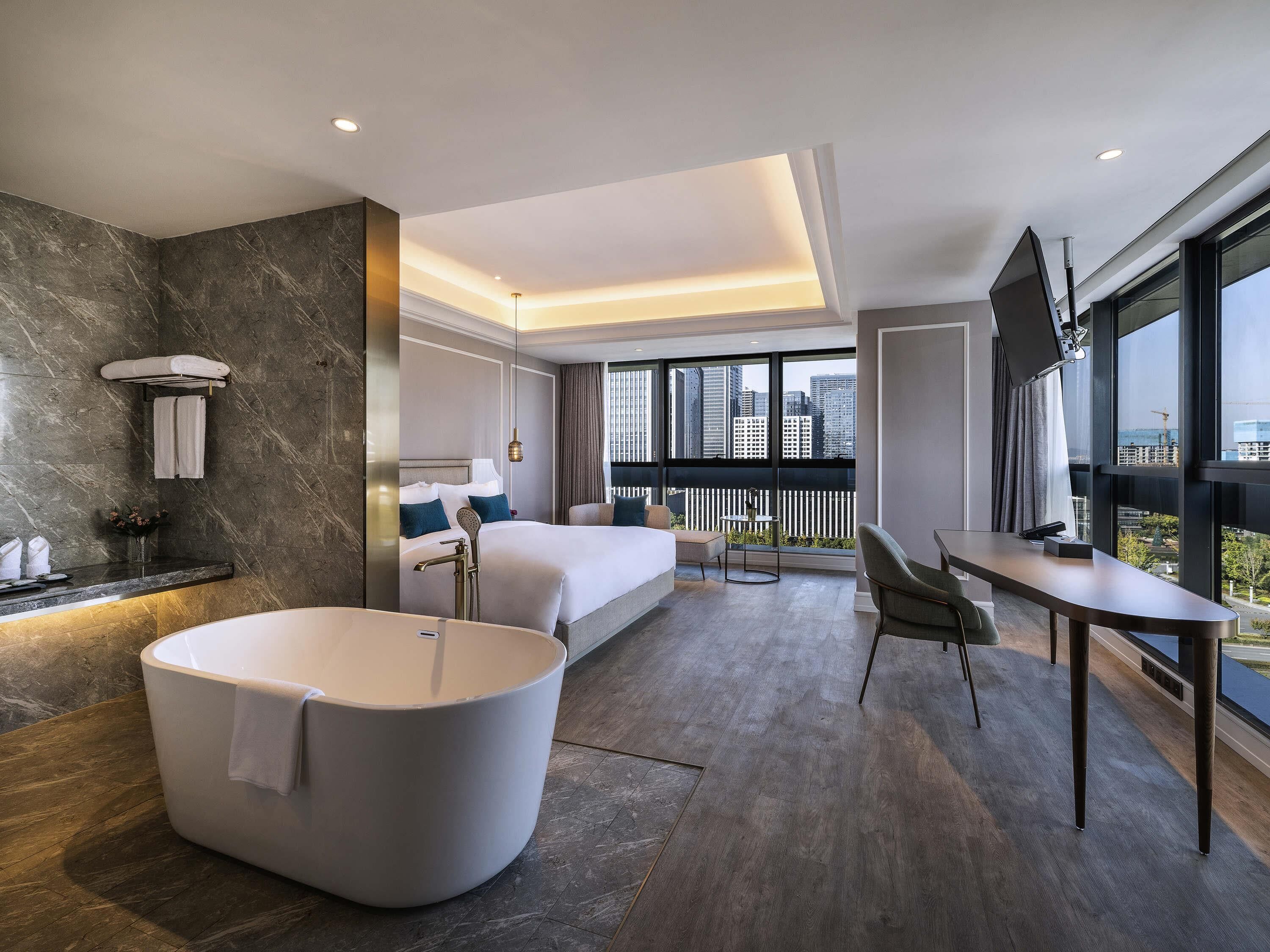 行政客房, 1 张特大床 | 迷你吧、客房内保险箱、办公桌、遮光窗帘