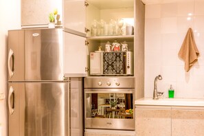 Classic Studio, Non Smoking | Private kitchenette | Full-size fridge, microwave, stovetop, electric kettle - Premium suites on the Beach in Ruppin 28 (Tel Aviv)