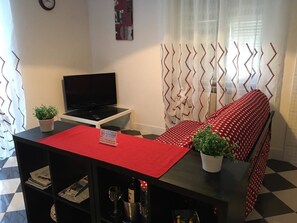 Quarto família | Sala de estar | TV de tela plana