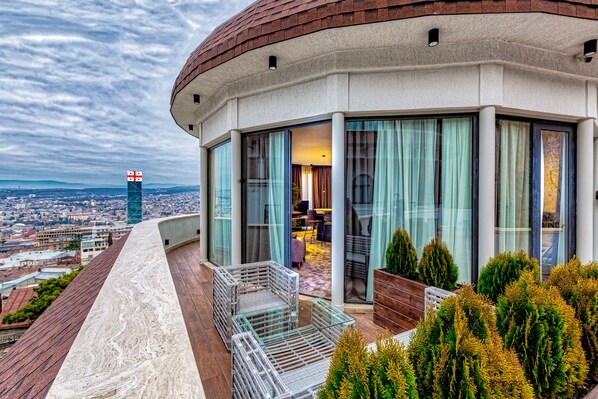 Quarto casal executivo | Terraço/pátio