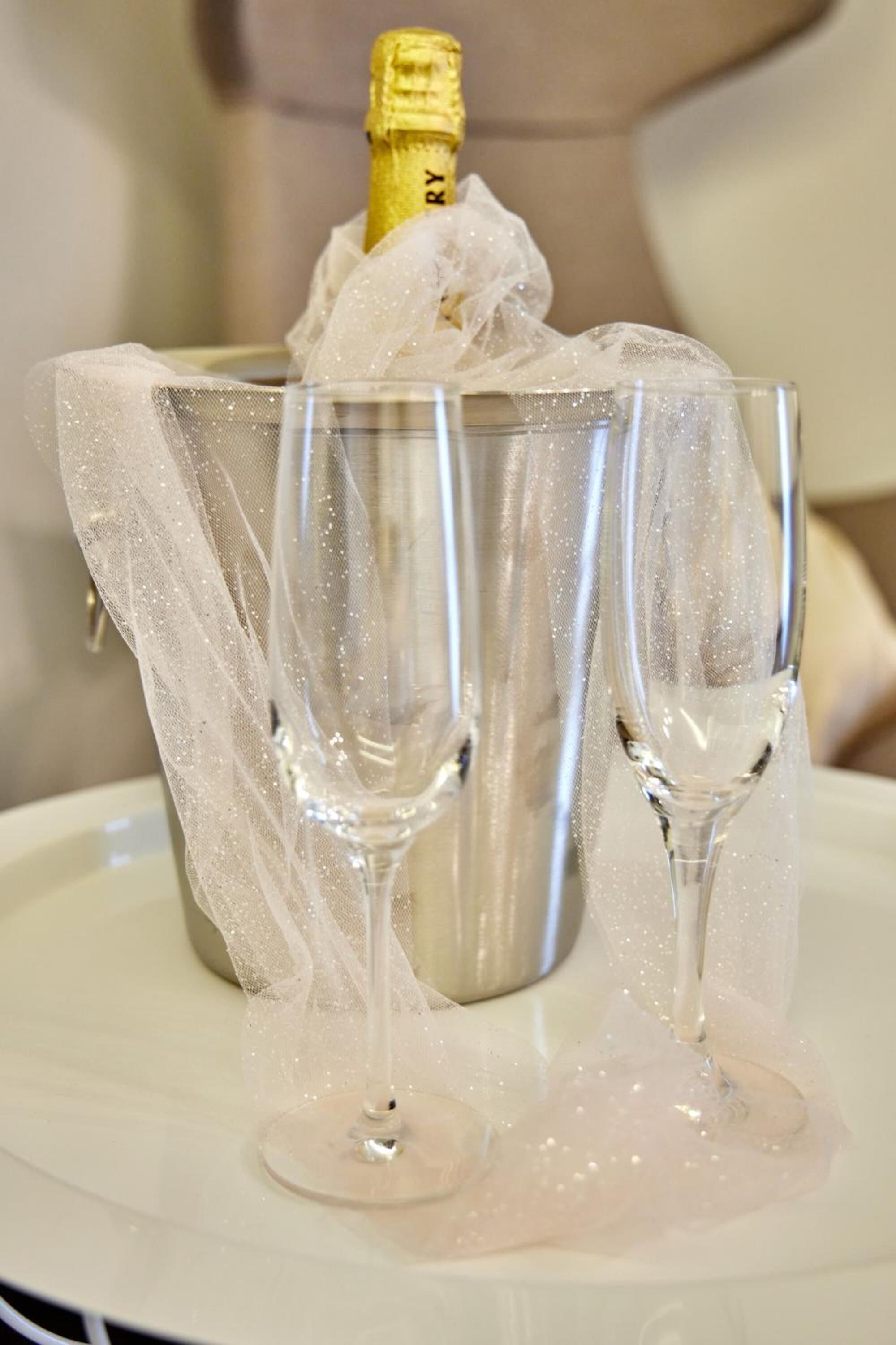 shower, hair dryer, towels, toilet paper