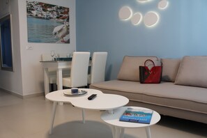Deluxe Apartment, Sea View (For 4) | Living room - Stelios Village Mykonos Airport (Mykonos)