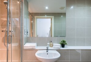 Apartment, 2 Bedrooms | Bathroom | Shower, free toiletries, hair dryer, towels