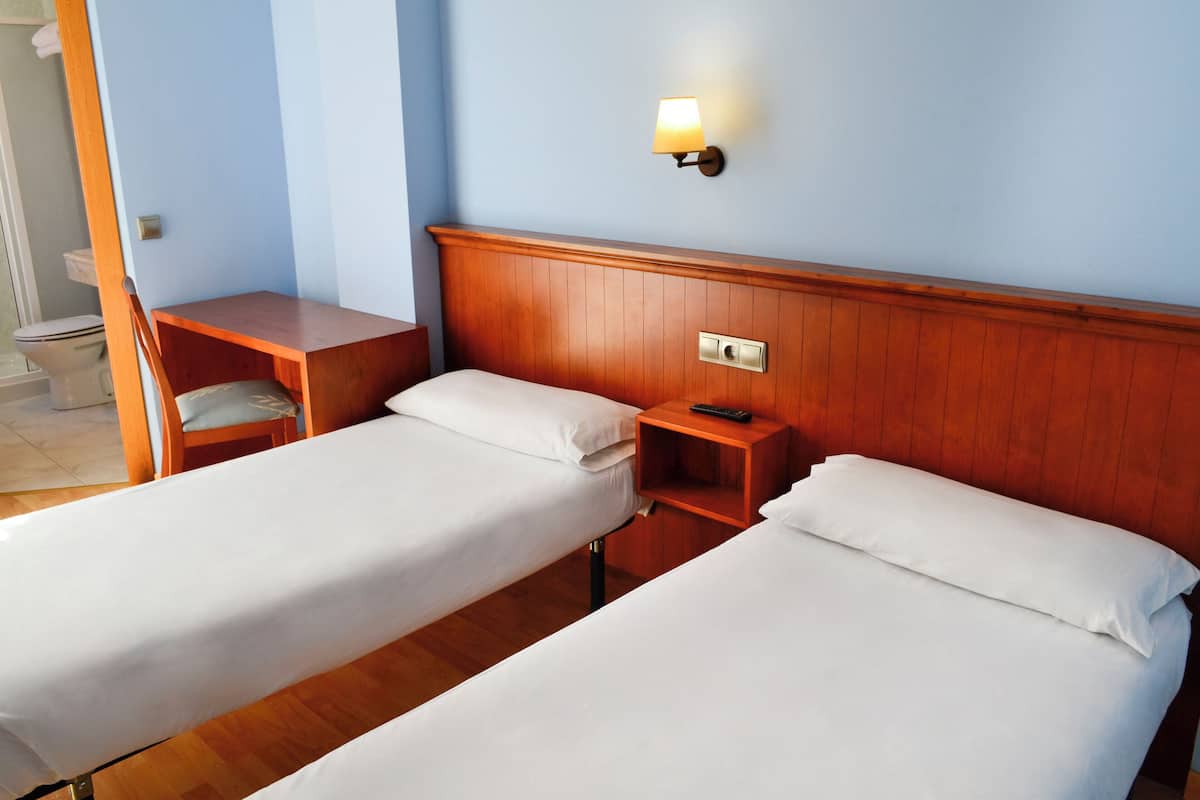 Desk, free WiFi, bed sheets