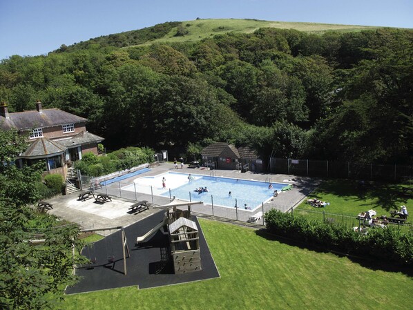 Seasonal outdoor pool, pool loungers