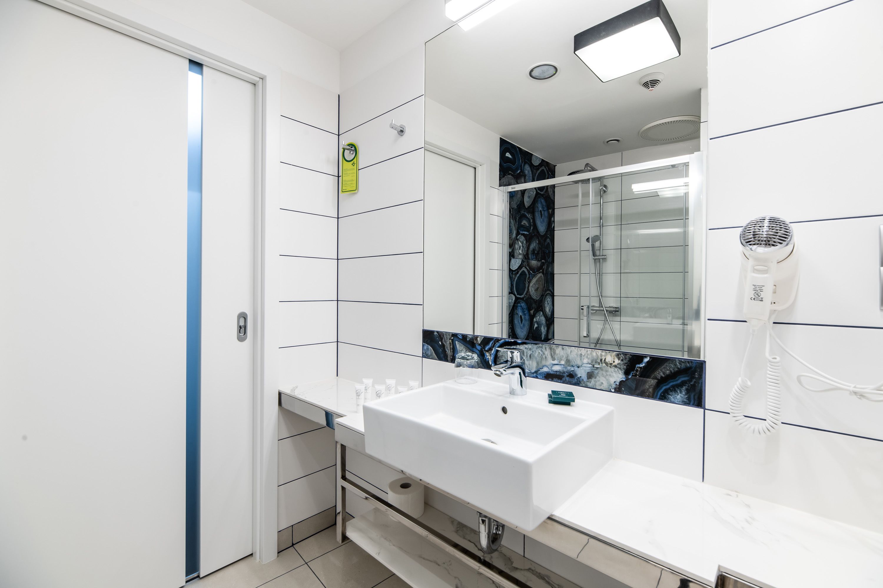 shower, free toiletries, hair dryer, slippers