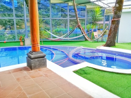 Indoor pool, outdoor pool. Green Resort