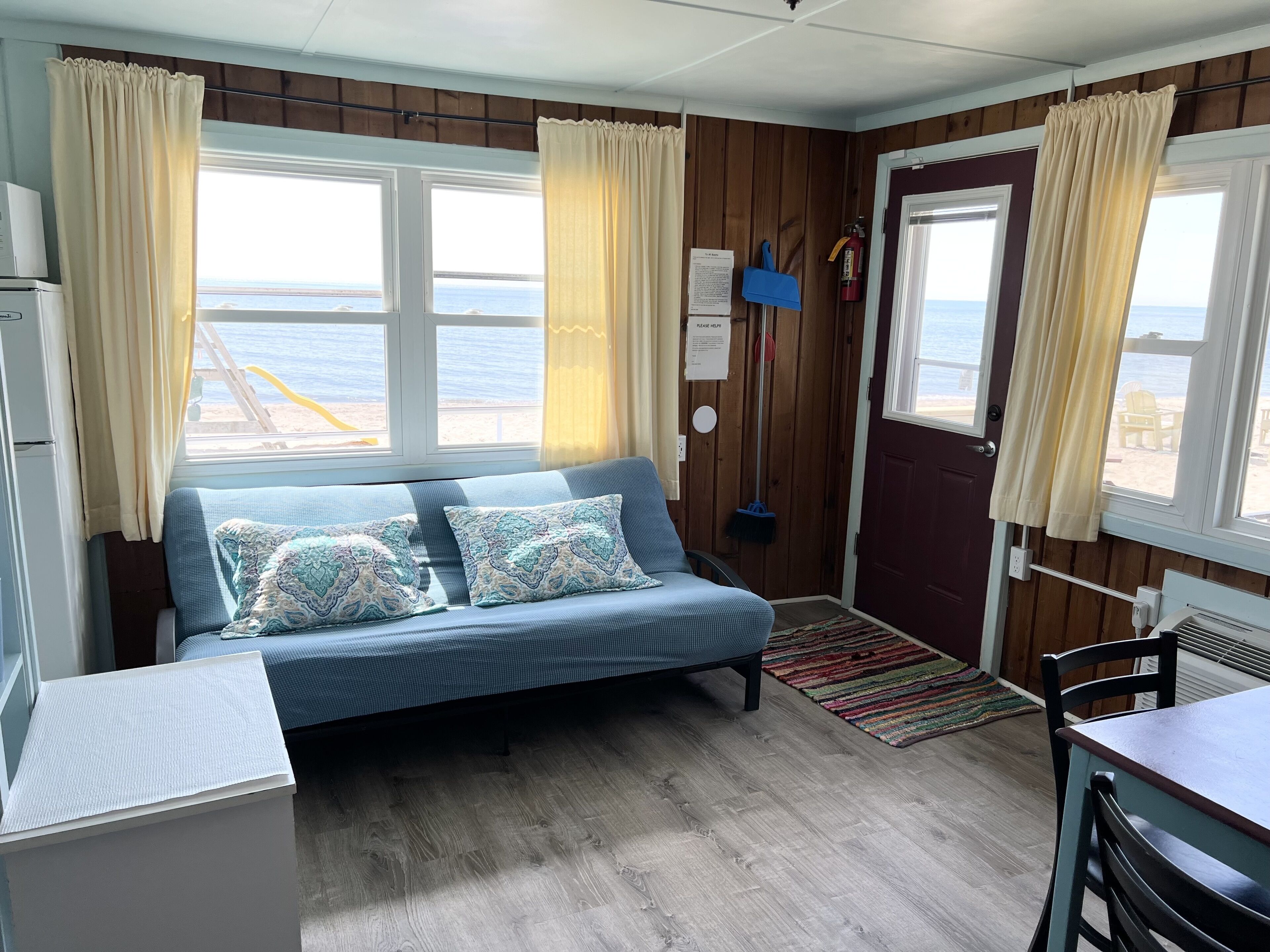 Deluxe Cottage, 2 Bedrooms, Non Smoking, Beachfront | Living area | Flat-screen TV