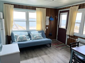 Deluxe Cottage, 2 Bedrooms, Non Smoking, Beachfront | Living area | Flat-screen TV - Paradise Beach Resort (Tawas City)