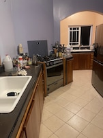 Shared fridge, blender, cookware/dishes/utensils, freezer