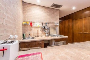 Fridge, stovetop, cookware/dishes/utensils, dining tables