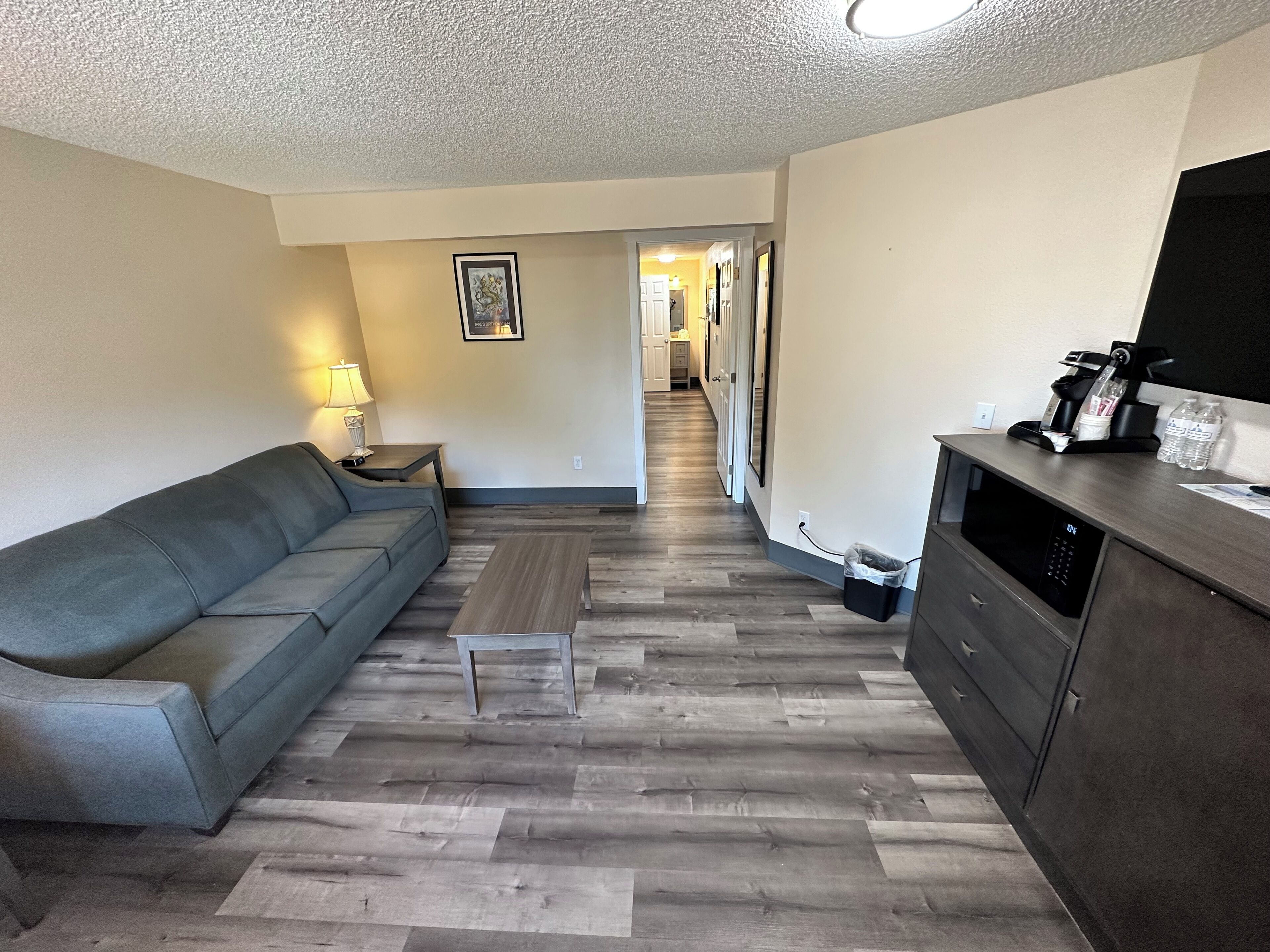 one bedroom queen suite | 1 bedroom, blackout curtains, free wifi, bed sheets