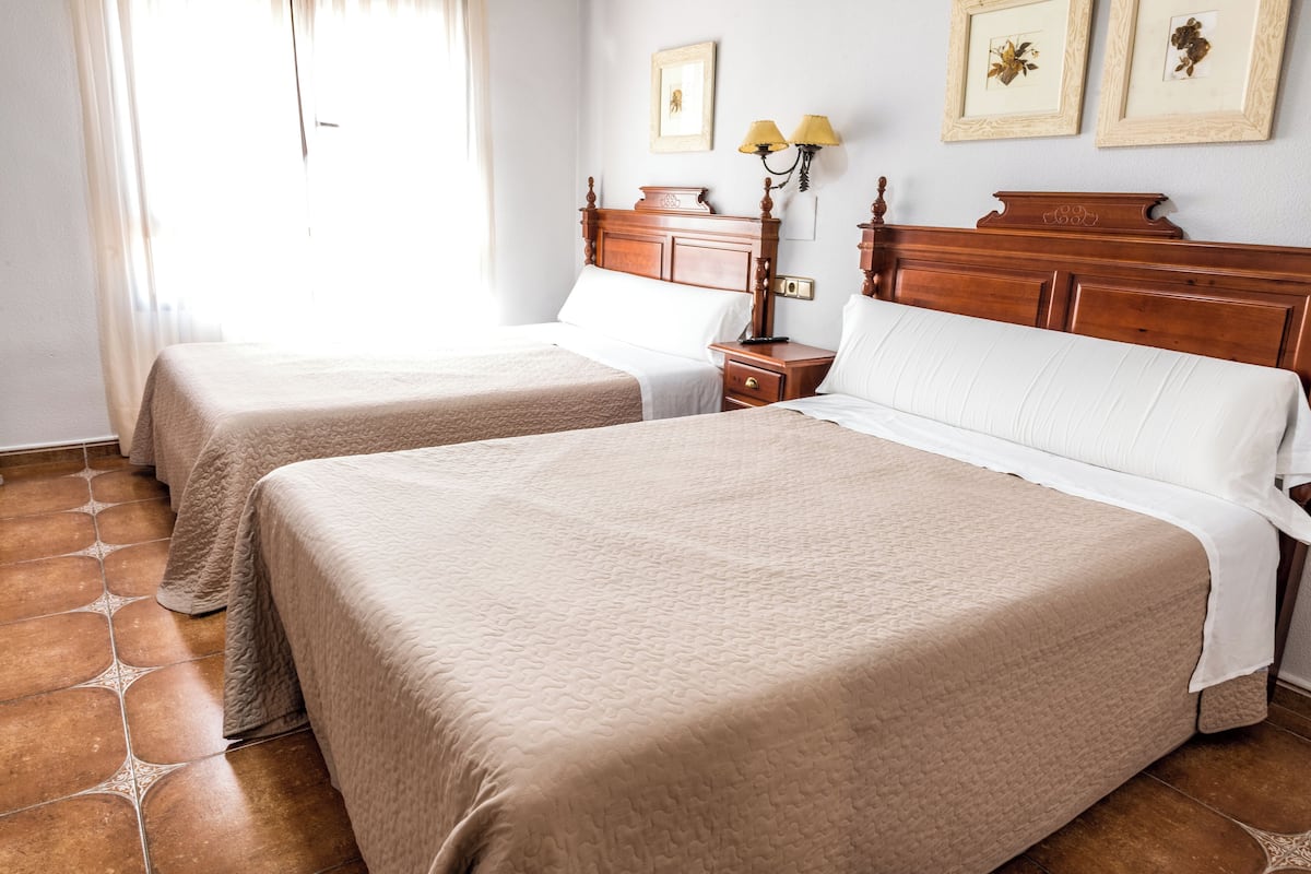 Triple Room, Multiple Beds | Premium bedding, down comforters, individually furnished, desk