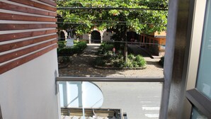 Quarto casal, para não fumantes, sacada | Cortinas blackout, Wi-Fi de cortesia, roupa de cama