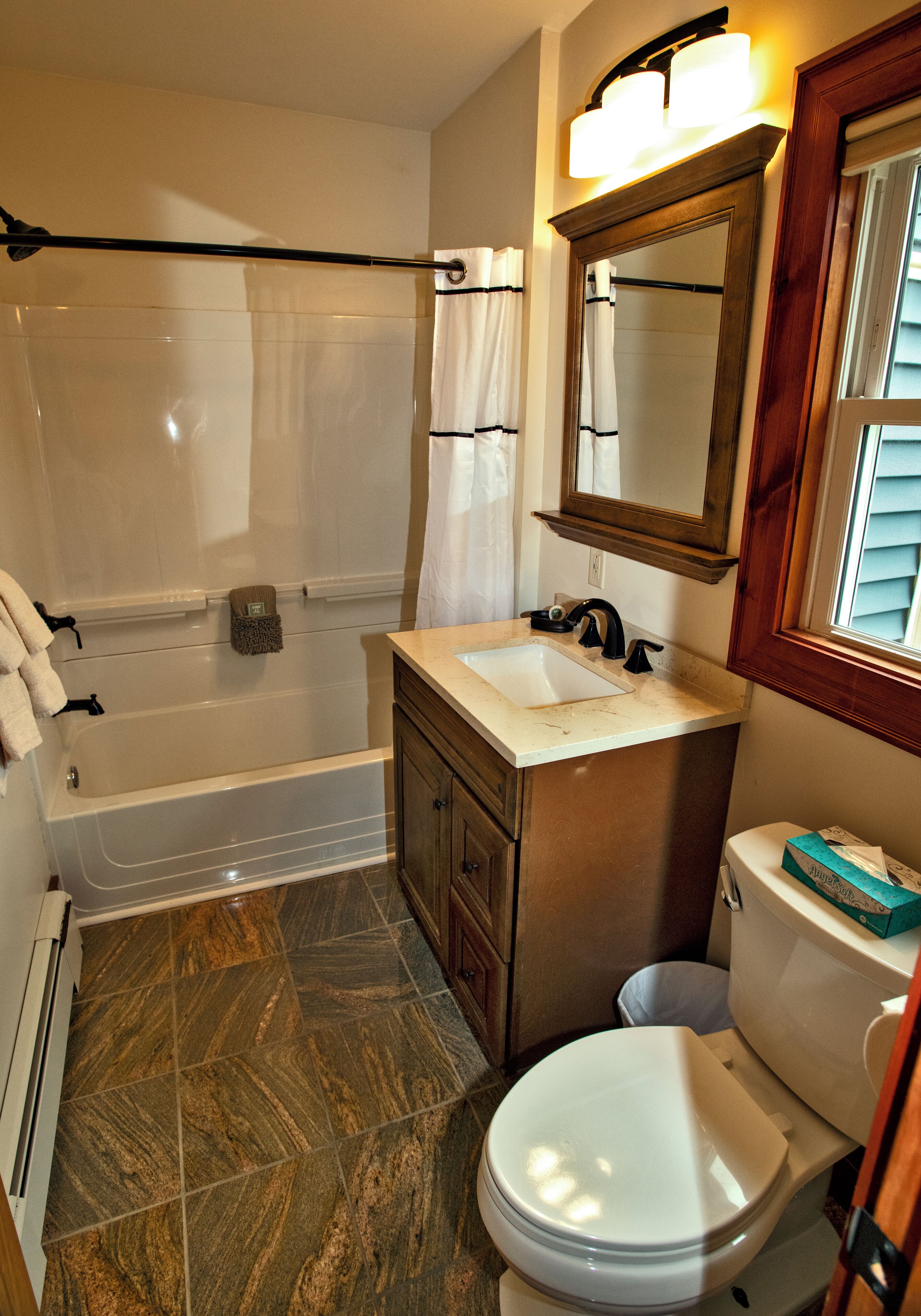 Beatty Cottage | Bathroom | Combined shower/tub, hair dryer, towels, toilet paper