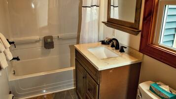 Beatty Cottage | Bathroom | Combined shower/tub, hair dryer, towels, toilet paper