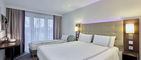 Chambre triple Standard | Système d’insonorisation, accès au Wi-Fi (inclus), literie fournie