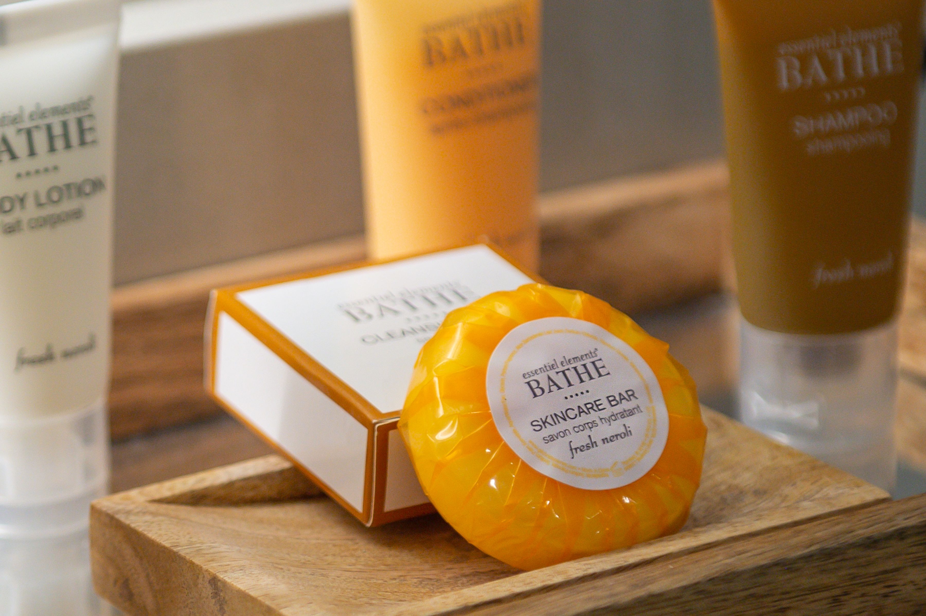 shower, designer toiletries, towels