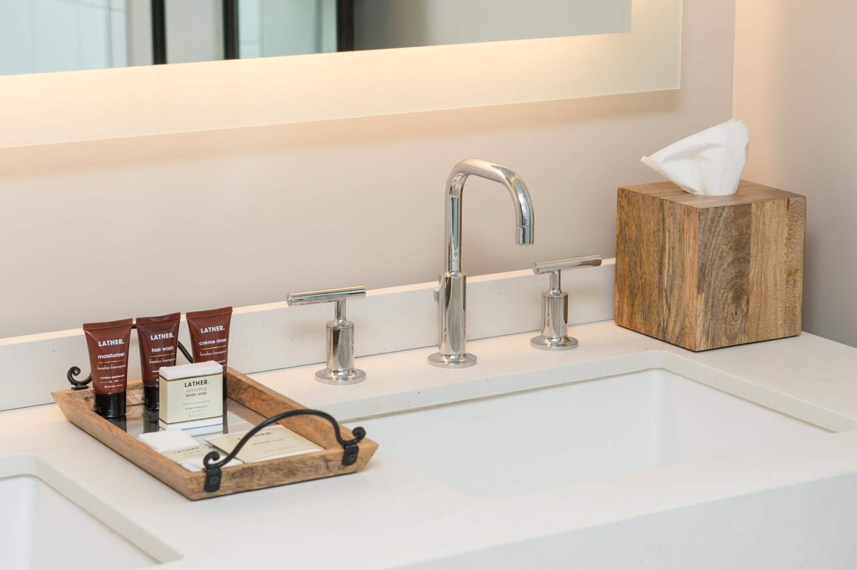 shower, designer toiletries, towels